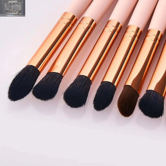 Makeup Wooden Handle Powder Gold Beauty Tools Makeup BrushProduct information: Brush set count: 11 Brush material: Nylon Brush bag type: bagged Brush handle material: wooden handle Brush handle specification: long rod Hair length specification: 1.5cm Tota