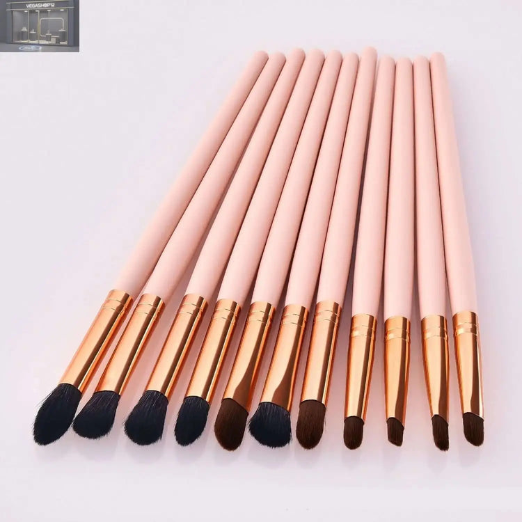 Makeup Wooden Handle Powder Gold Beauty Tools Makeup BrushProduct information: Brush set count: 11 Brush material: Nylon Brush bag type: bagged Brush handle material: wooden handle Brush handle specification: long rod Hair length specification: 1.5cm Tota